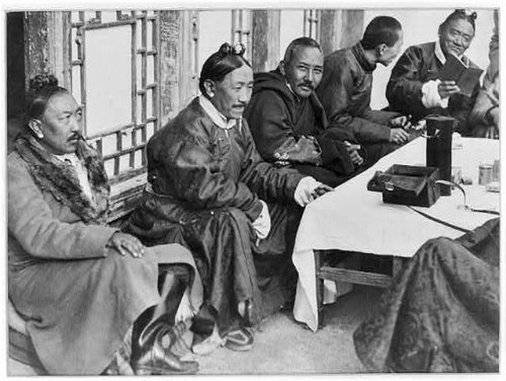 Early photograph (c. 1930) of high officials in Tibet, a region rarely seen and uncharted by western cartographers prior to the pundit program.