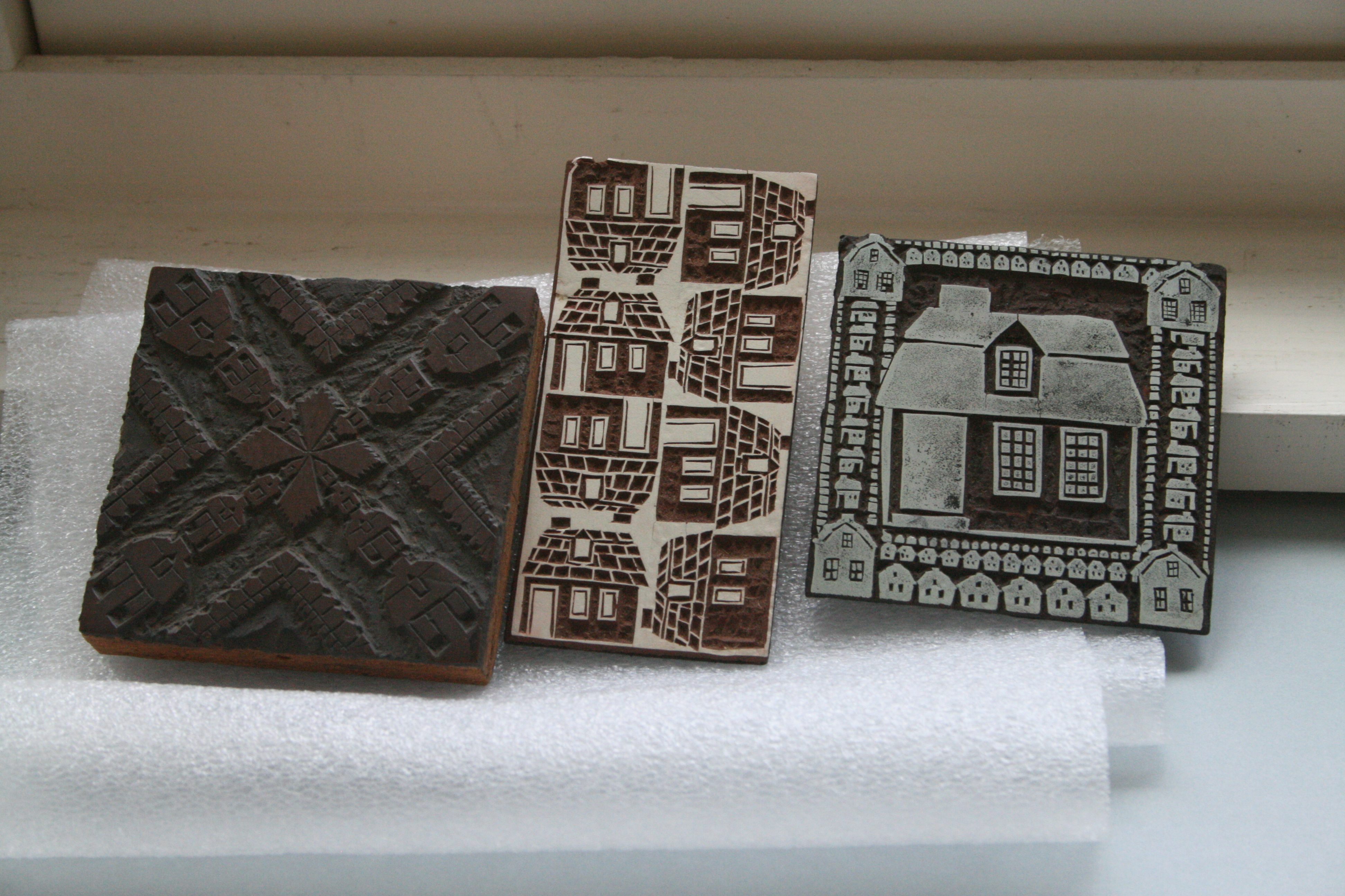 Early block print drafts of Peggy Norton's <em>Story and a Half House</em>, held at the Cape Ann Museum. 