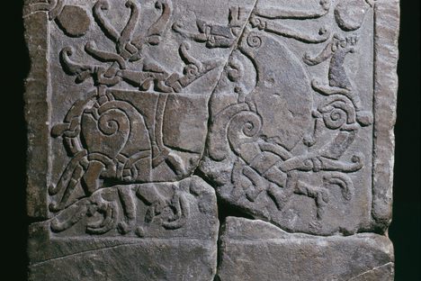 The tombstone found at St. Paul's Cathedral, carved in the classic Ringerike style. 
