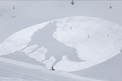Watch an Artist Walk Thousands of Steps to Create Wolves and Leaves in the Snow