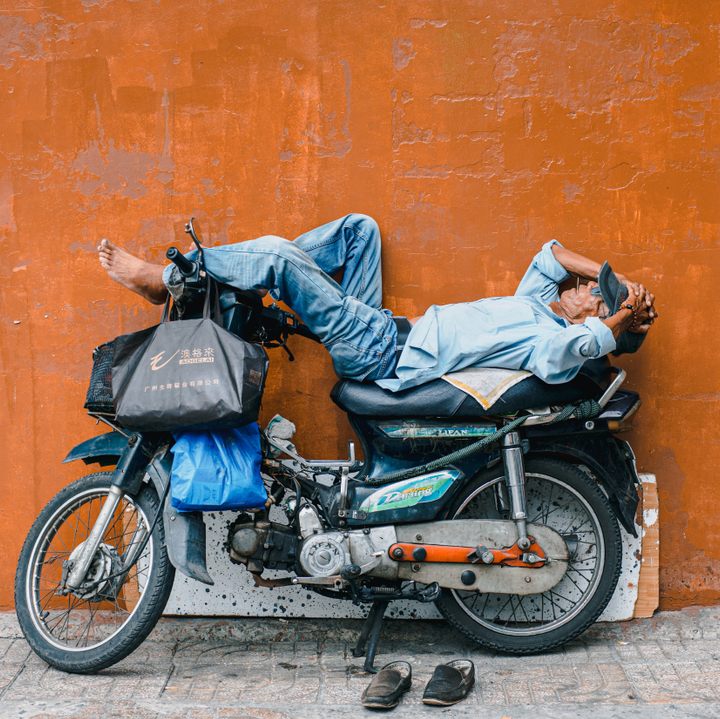 A local taking a scooter nap.