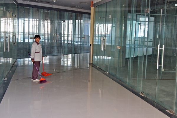 A slightly lonely cleaner at the New South China Mall.