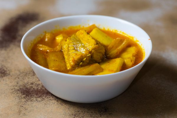 This tart, thin, turmeric-tinted broth packs a real punch.