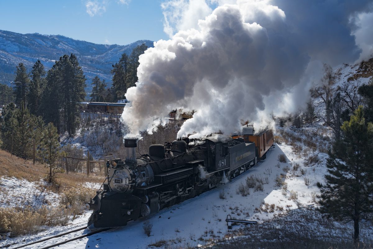 The Durango-Silverton Train billows with steam along its 26-mile winter trek to Cascade Canyon.