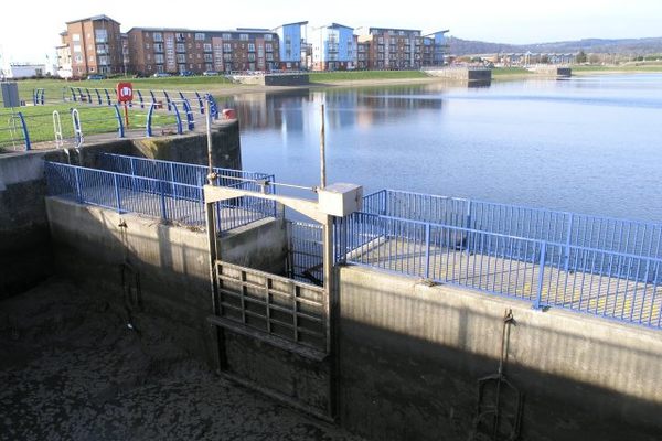 The hydraulic tidal gates have been replaced by this simple sluice