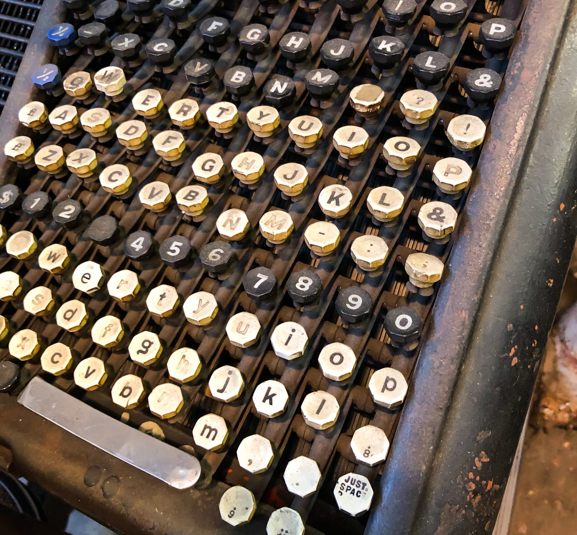 A Monotype keyboard features a familiar QWERTY layout, but with separate keys for upper and lower case.