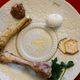 A seder plate, with maror (horseradish) on the left.