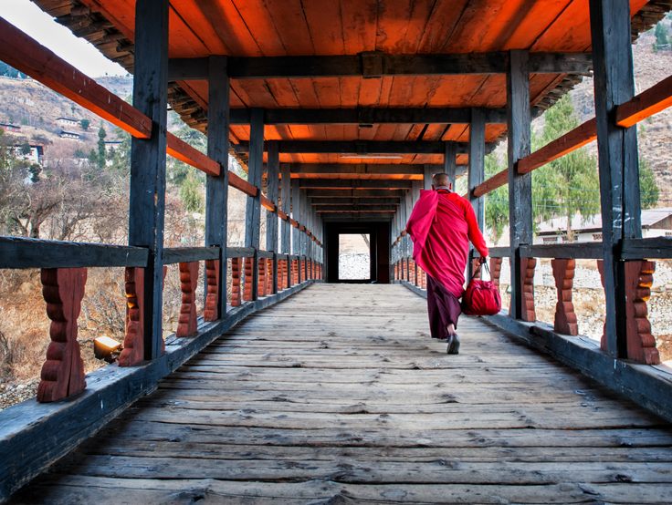 Monk walking towards Rinpung Monastery, Paro, Bhutan