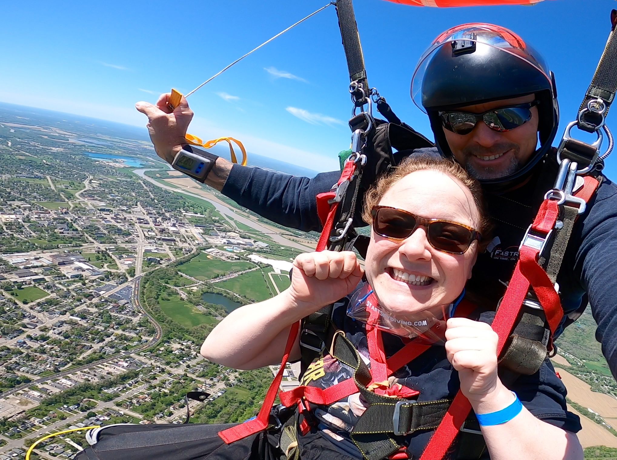 Macy skydiving in (above) Ohio.