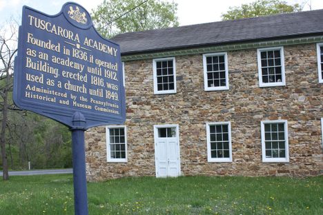 A plaque telling the story of the Tuscarora Academy.