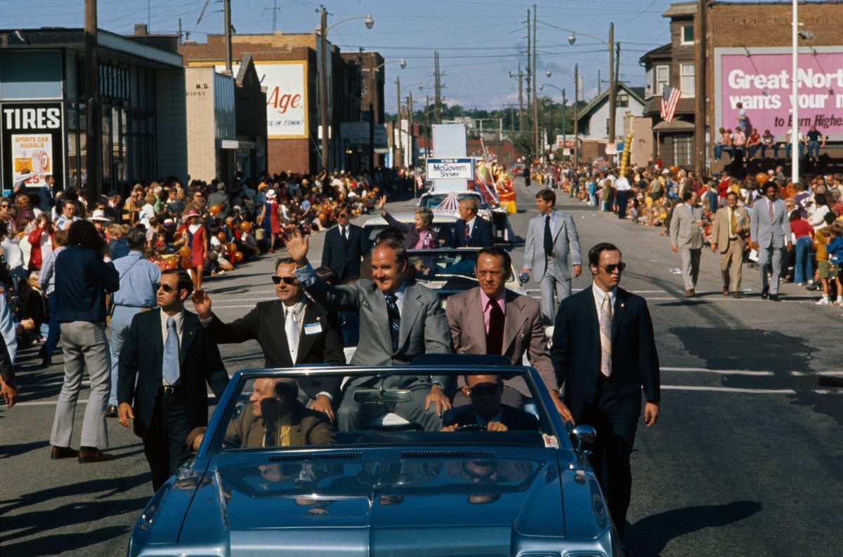 Presidential candidate Senator George McGovern parades through downtown Barberton in the midst of "the golden age of chicken."