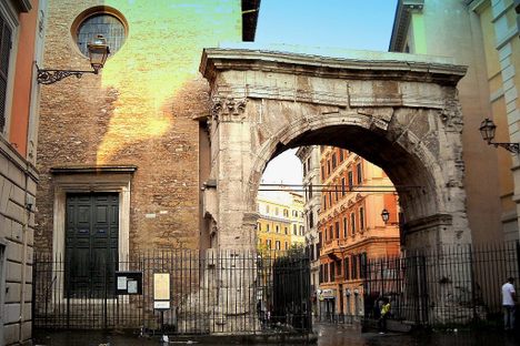 The Arch of Gallienus, the Church of Saints Vito and Modesti on the left 