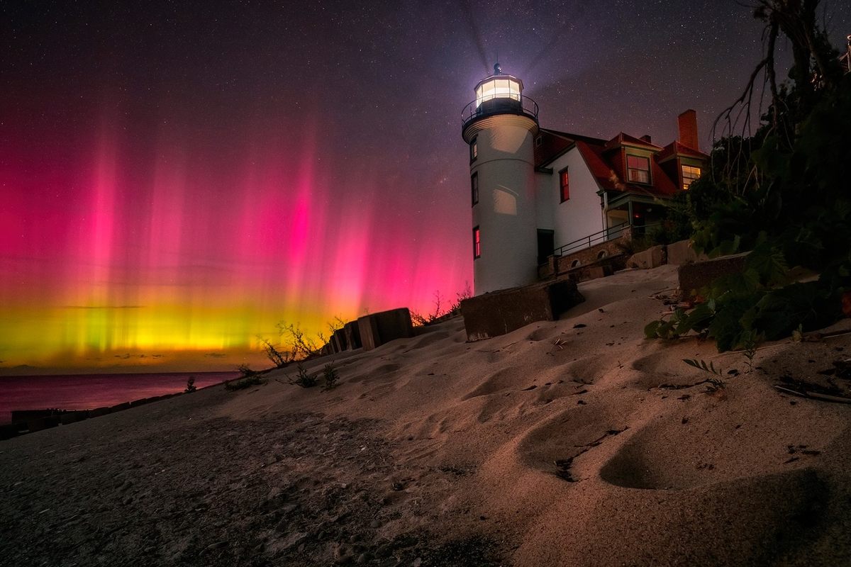 High on the west side of Michigan’s “mitten,” the 19th-century Point Betsie Lighthouse competes with—and loses out to—the more brilliant northern lights. While auroras can occasionally be seen in the lower 48 during periods of intense solar wind activity, they appear on the northern horizon rather than overhead. The unusual pink and yellow colors are the result of oxygen and nitrogen mixing together.