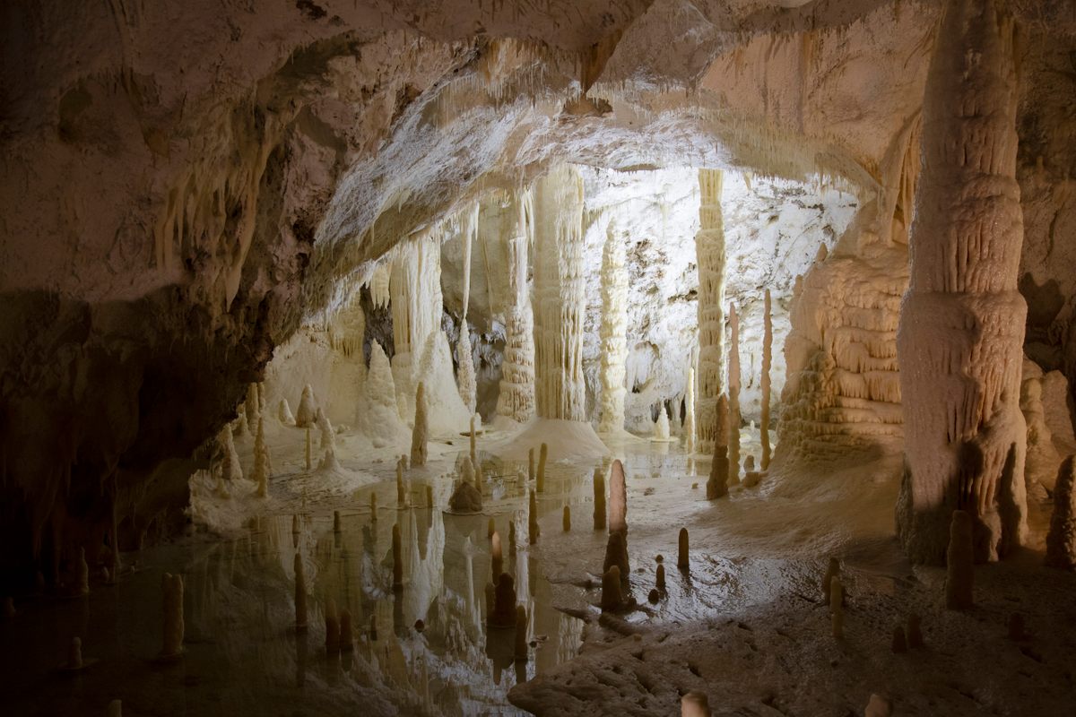 Northern Italy is dotted with karst cave systems like this one. As water drips from the ceiling and creates stalagmites and stalactites over centuries, it also preserves a record of regional climate patterns.