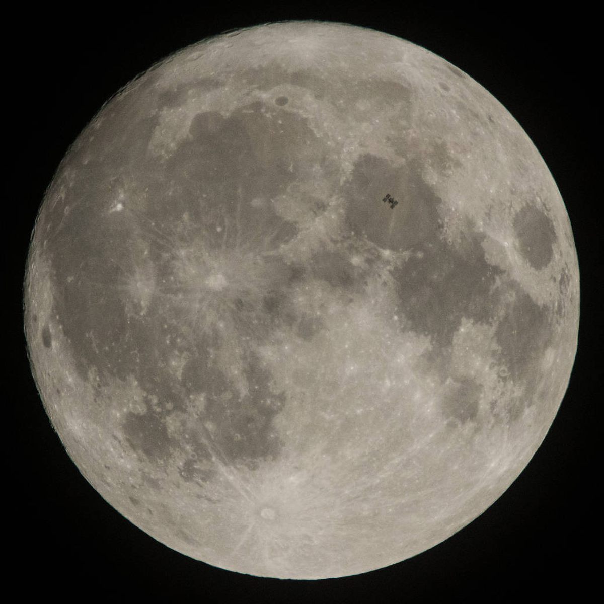 The International Space Station transits the Moon, December.