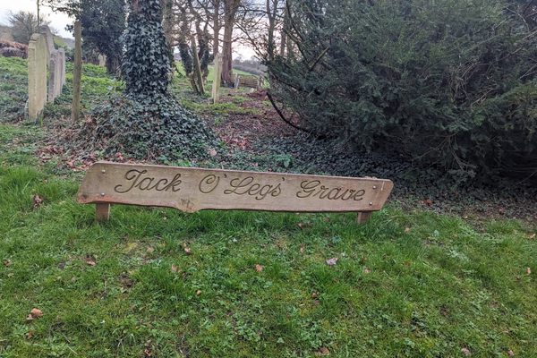 The sign marking Jack O’ Legs’ grave