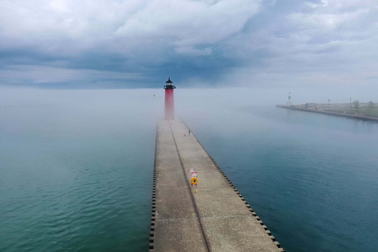 On May 23, 2021, atmospheric fog and clouds accompanied a pneumonia front in Kenosha, Wisconsin. 