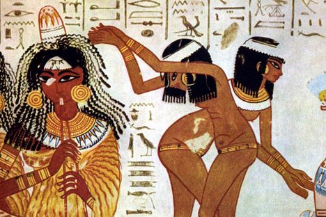 On the left, a musician wears an unguent cone.