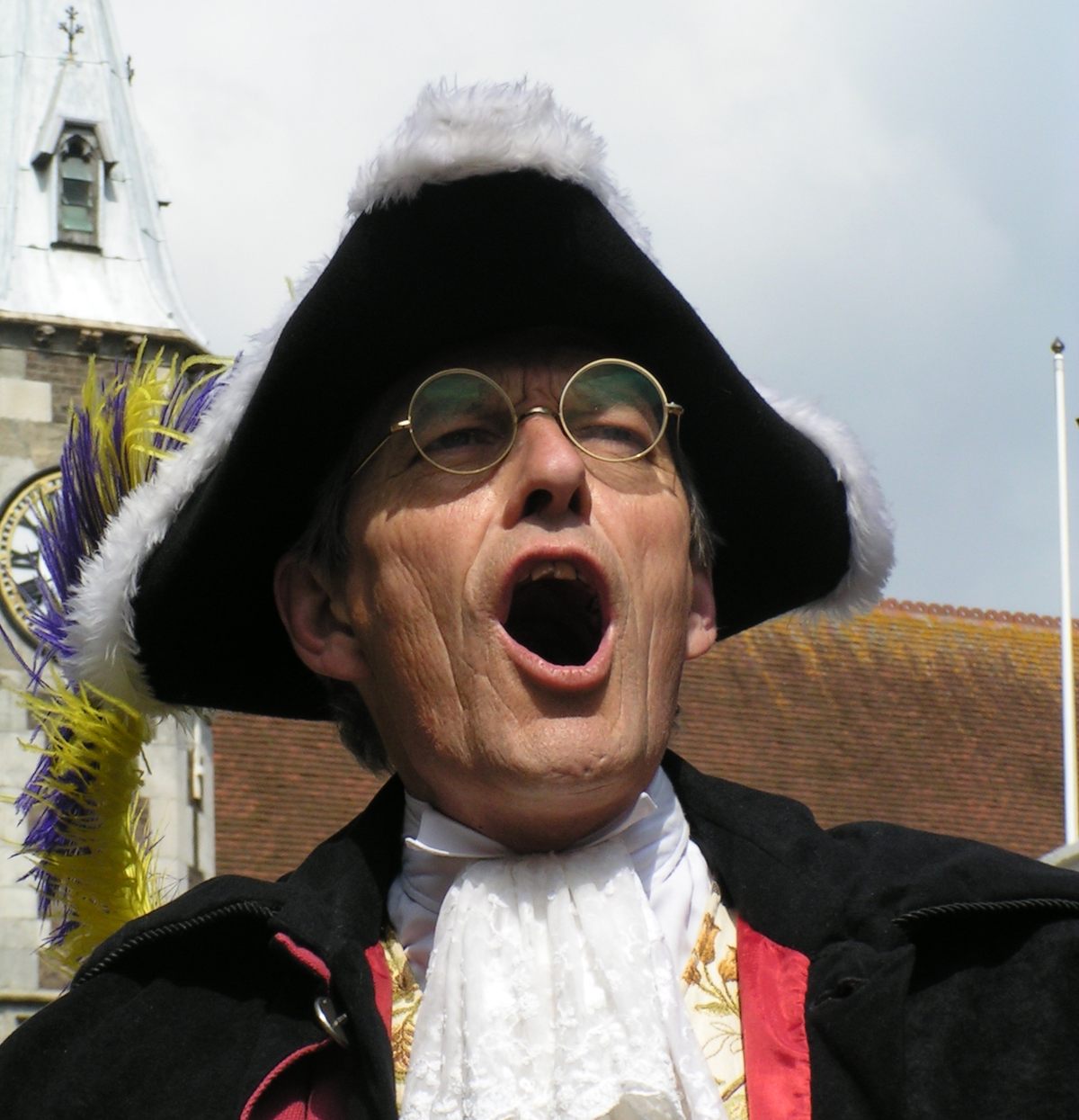 Dorchester's town crier, Alistair Chisholm, has won multiple titles during his quarter-century of competitive shouting.