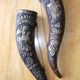 Wine may be passed around in a khantsi, a Georgian drinking horn.
