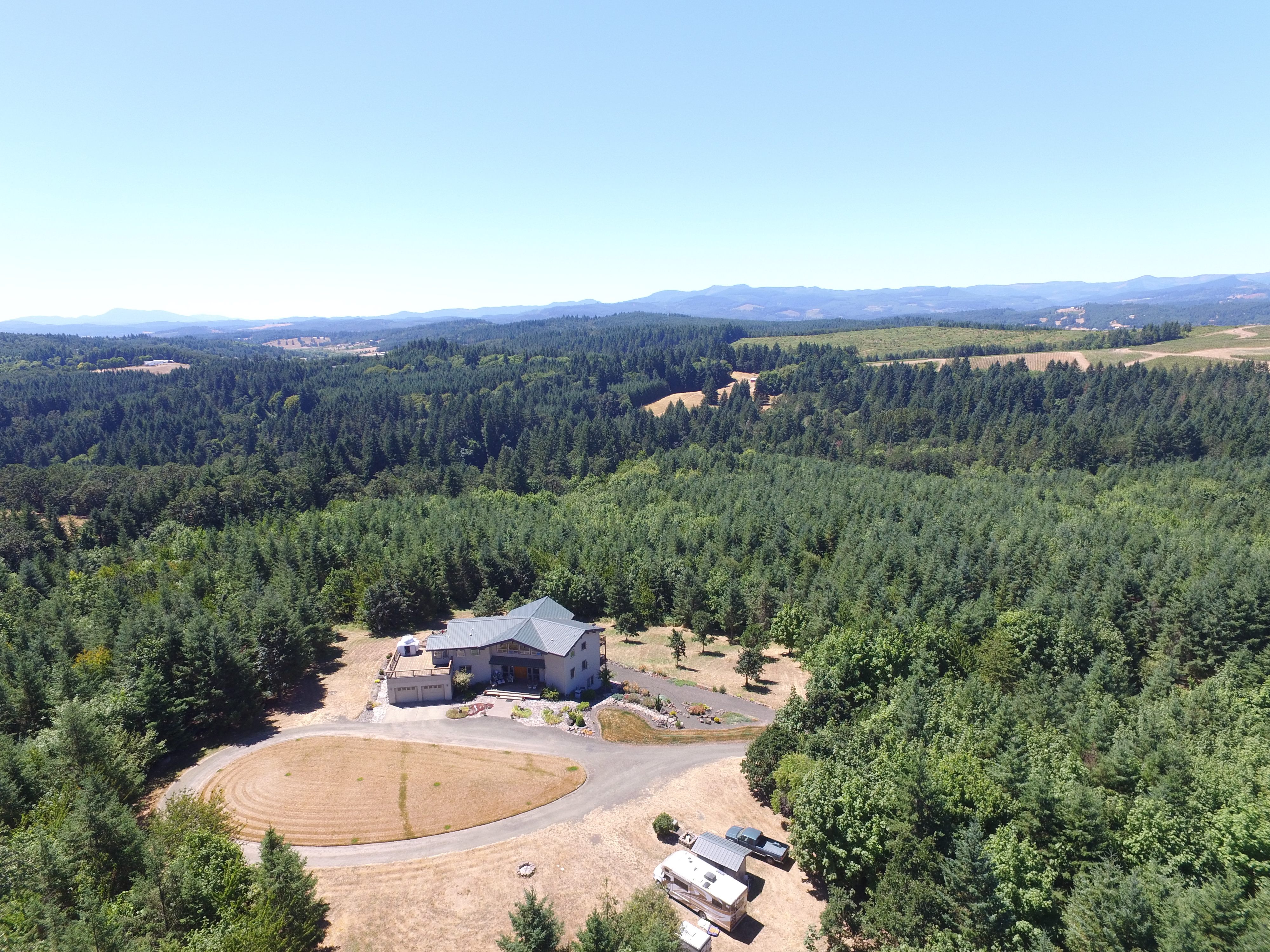 The house is positioned to the north of the dome, and viewing field next to it keeps heat from the house from obscuring the most desirable views of the sky.