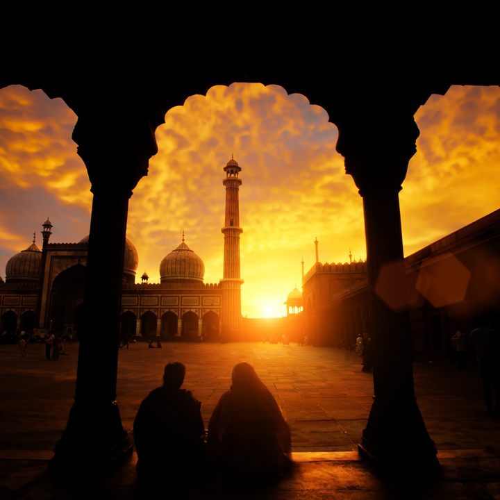 The sun sets behind Jama Masjid.