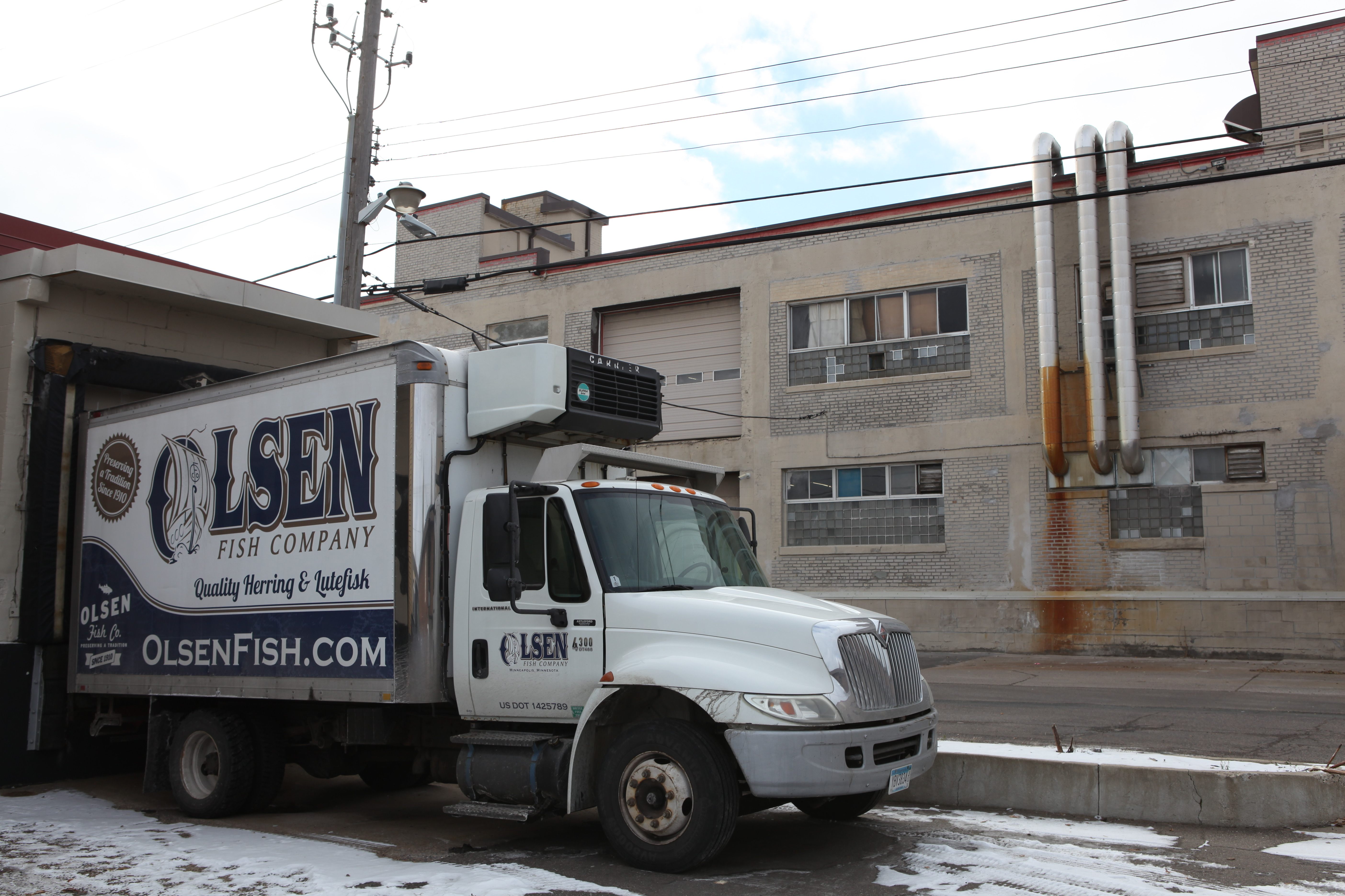 Olsen Fish Company delivers thousands of pounds of lutefisk, stockfish, and herring in large trucks that double as billboards. 