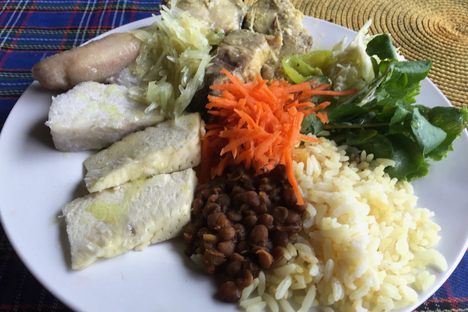 A traditional meal of fish and provisions (tubers and vegetables) served on the Caribbean island of Dominica.
