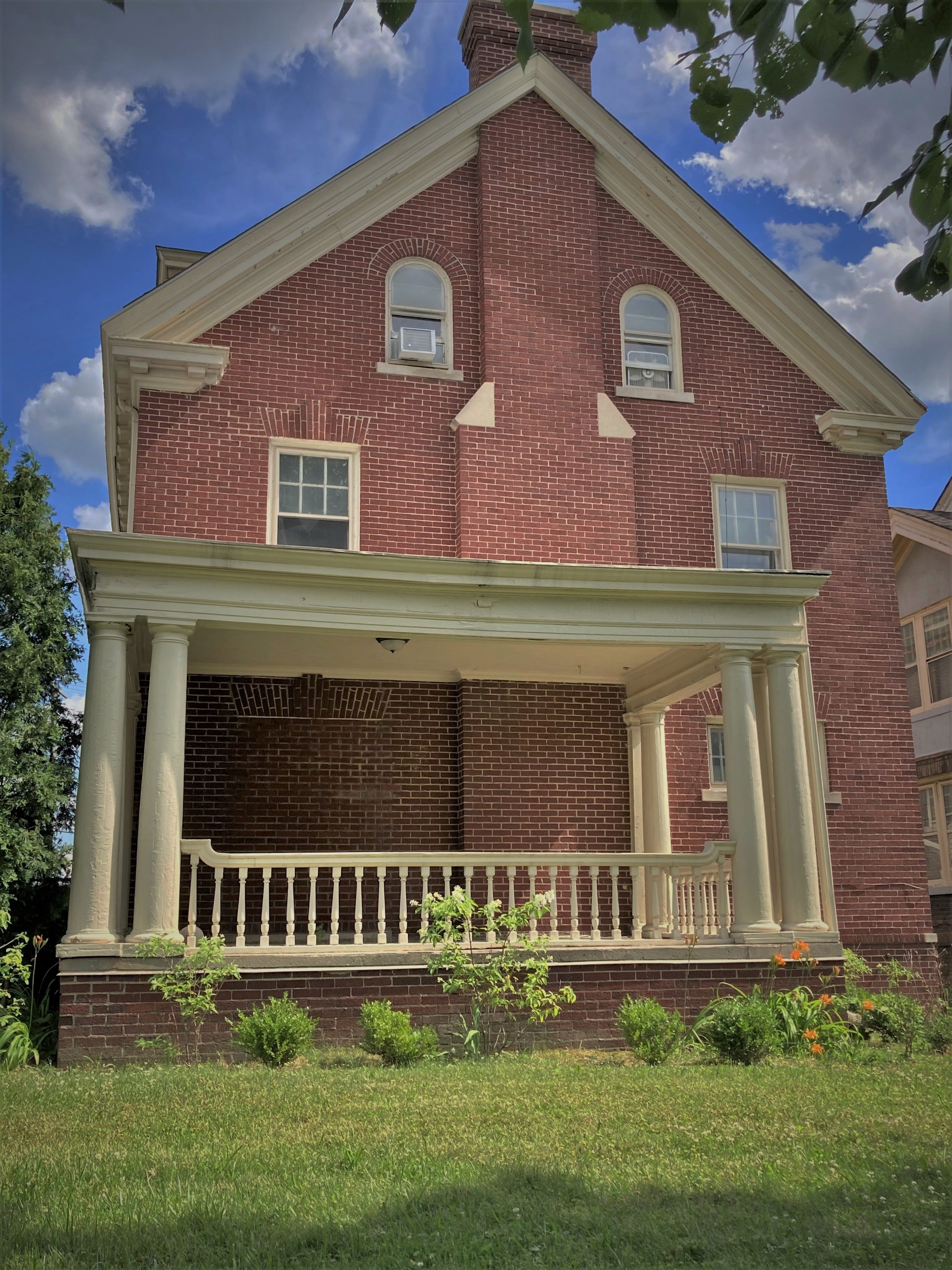 Evidence of Rosa Slade Gragg's defiance of Ferry Street's racist restrictive covenant can still be seen on the house. A rectangle of discolored bricks remains where a door once opened on to the segregated block.