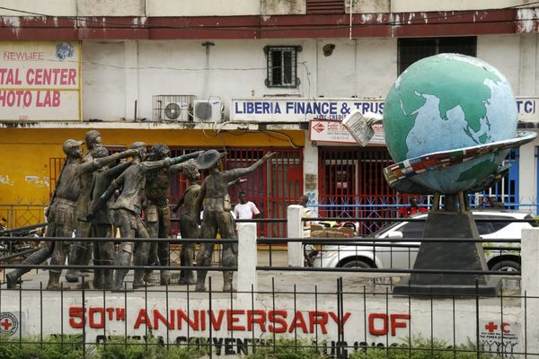 Artwork outside the entrance to the Liberian National Museum, commemorating the 50th anniversary of the Geneva Conventions.