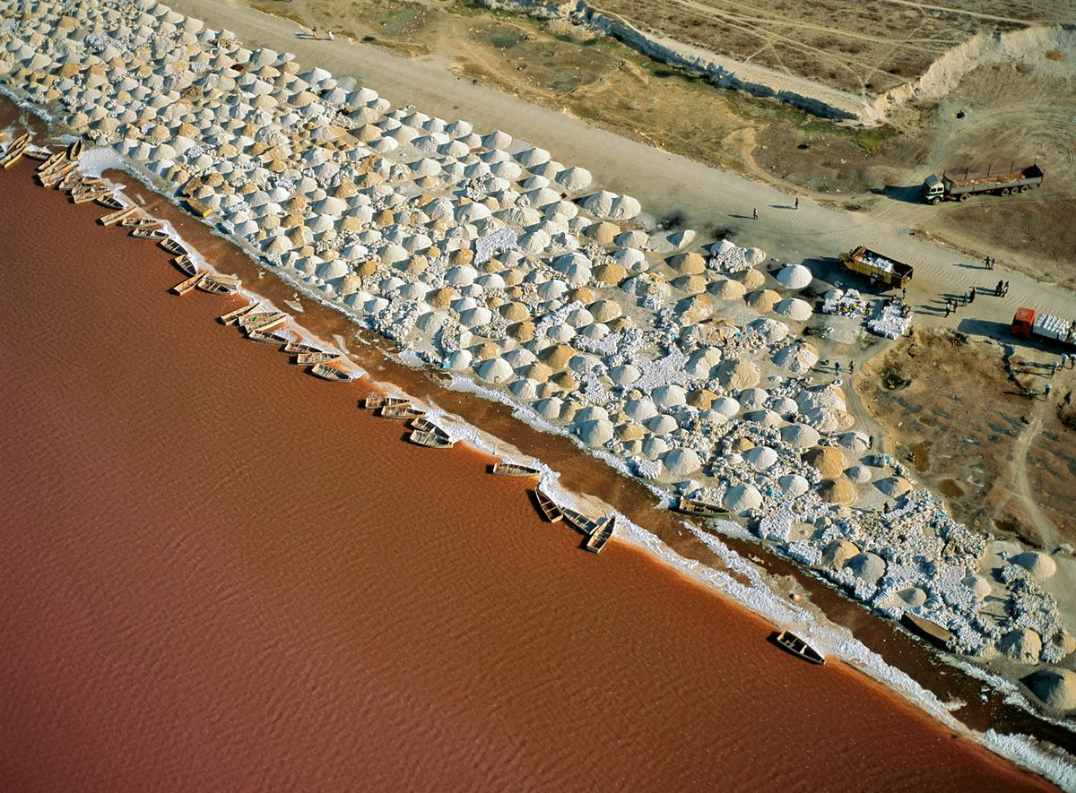 Conical piles of salt dry on the shore before they're taken to market near Dakar.