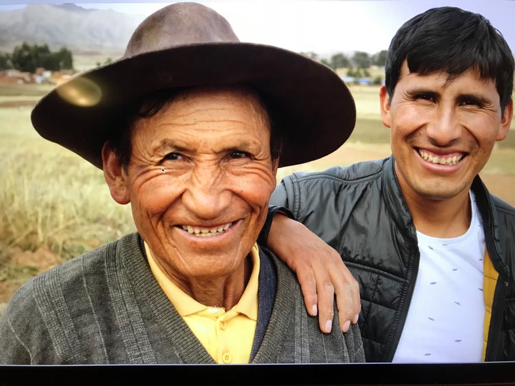 Father and son on the family farm.