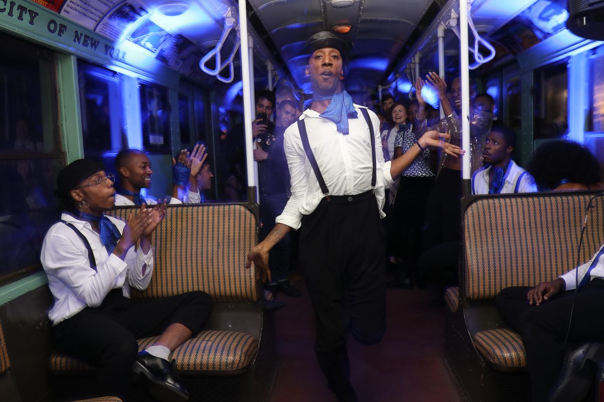 Vogueing in a packed subway car.
