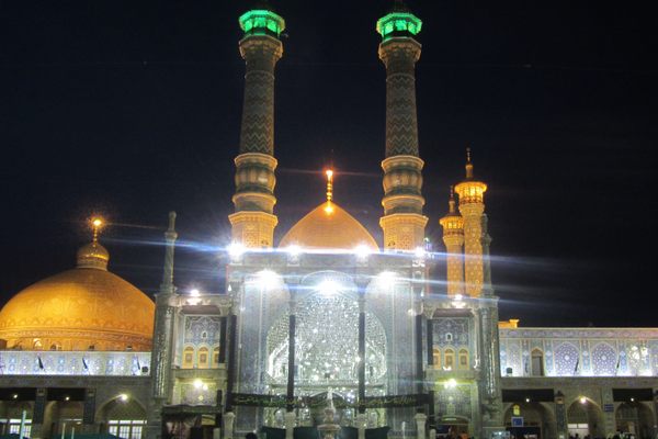 Fatemeh Maasoume Shrine at night.