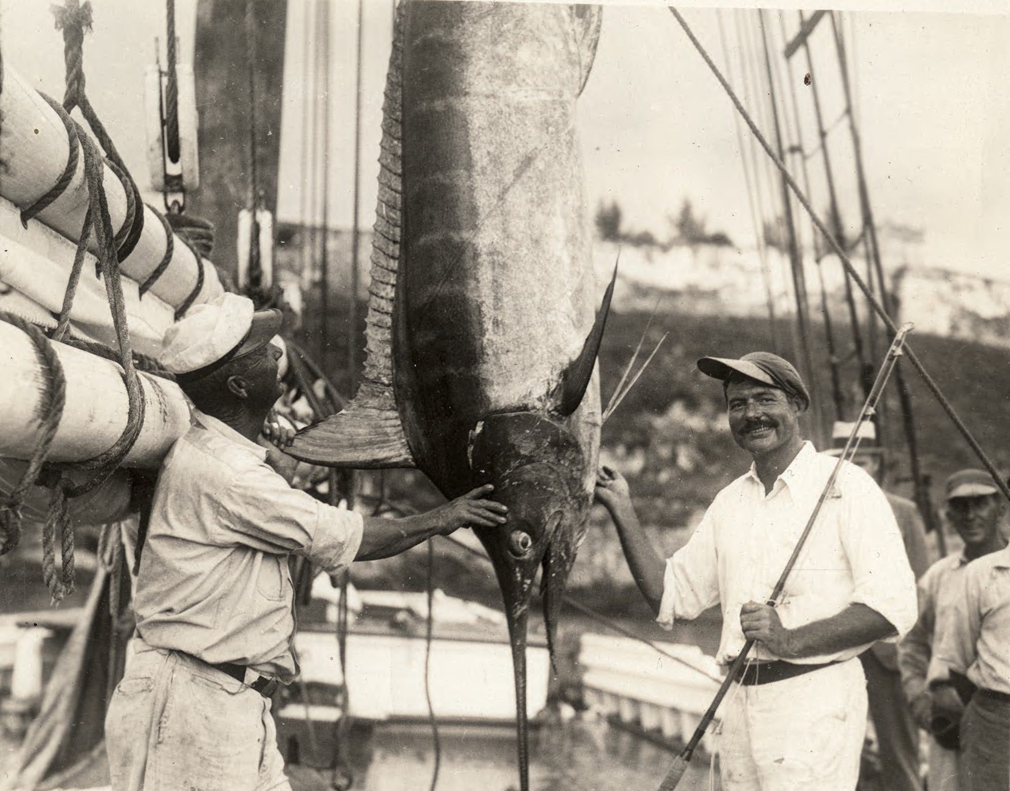 Ernest Hemingway with a fish he caught for the Academy of Natural Sciences in Philadelphia.