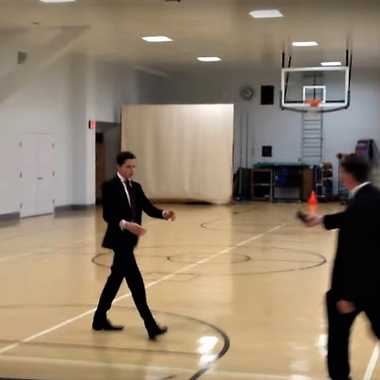 Lucky visitors to the Supreme Court play basketball.