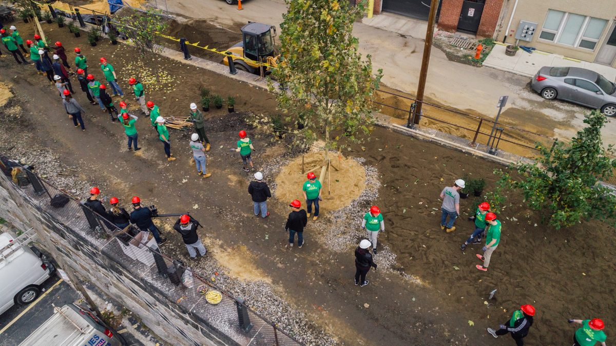 Volunteers gather to help transform the Rail Park into an urban green space.