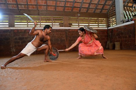 Meenakshi Amma, shown here at age 76, continues to teach students kalaripayattu in her “kalari,” or arena, in Kerala, India, today.