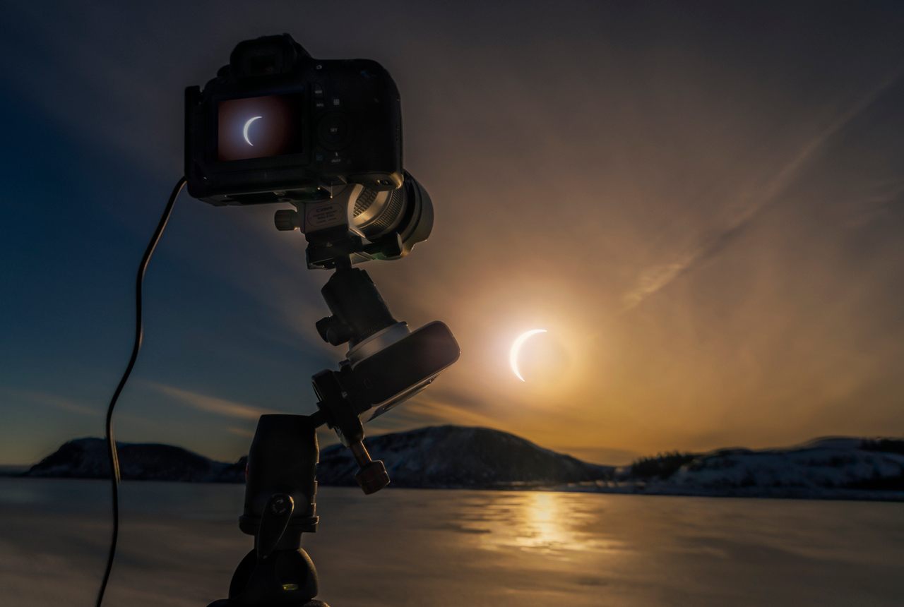 A solar eclipse underway in Iceland's Thingvellir National Park. The island nation will be in the path of totality again in 2026.