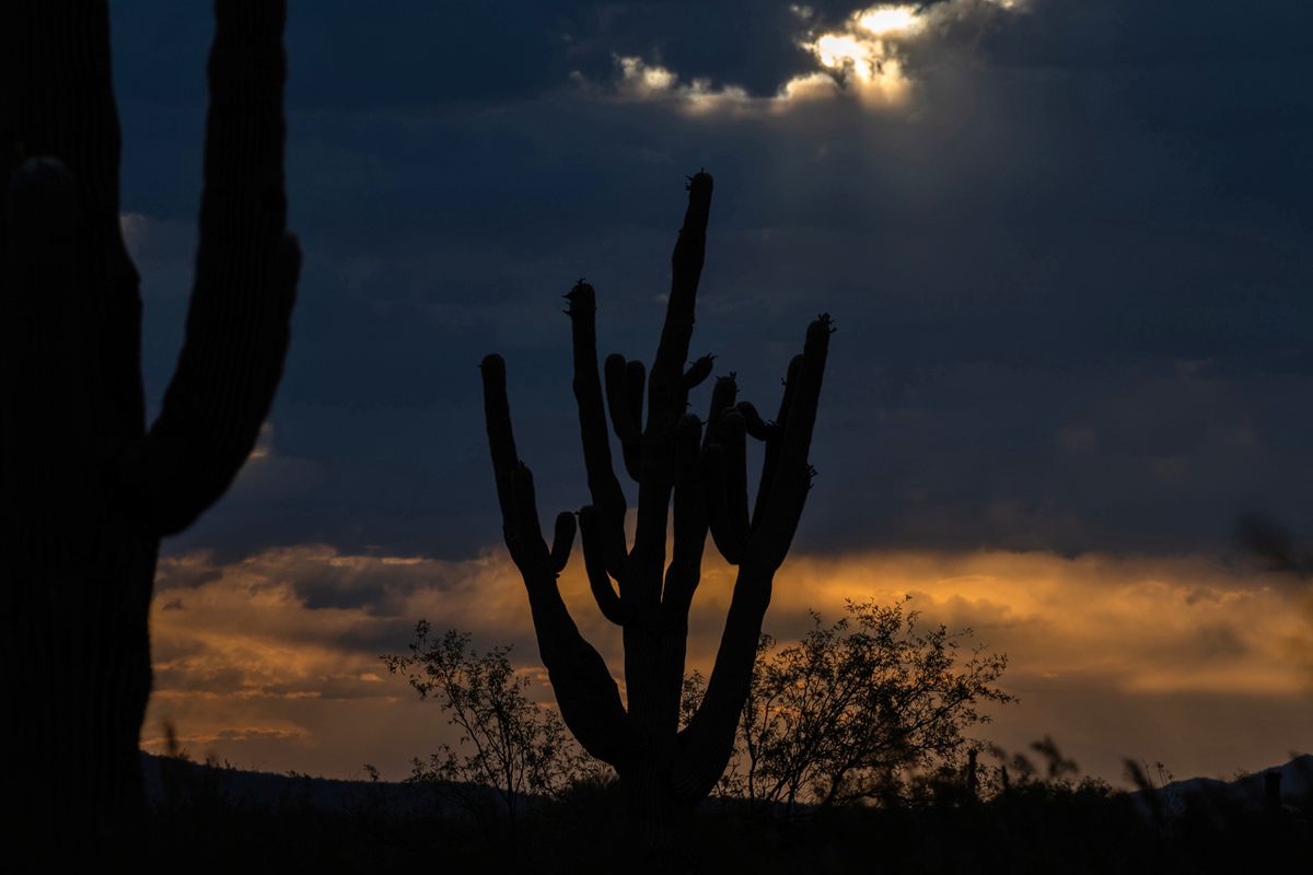 The sun peeks through a pre-monsoon cloud cluster.