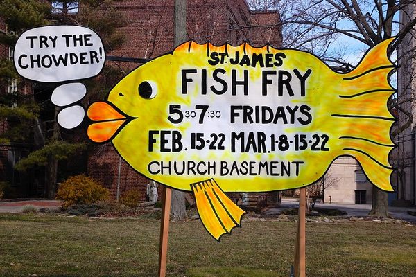 A sign for a church fish fry.