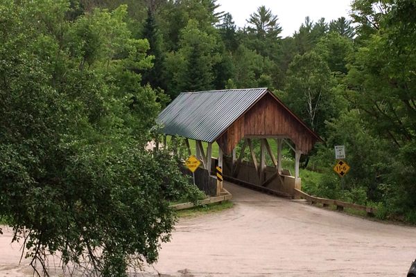 A covered bridge marks all that has been lost