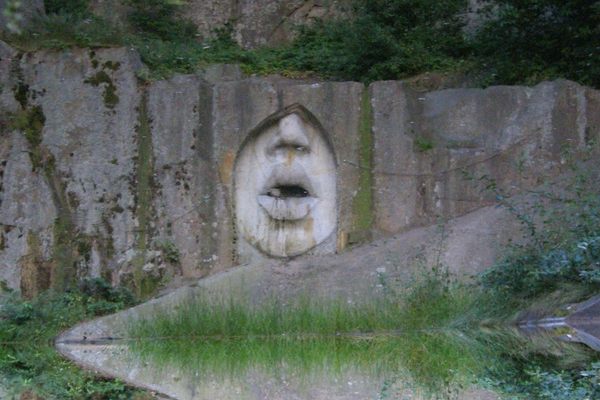 Mouth of Truth reflecting off the water in the former quarry.
