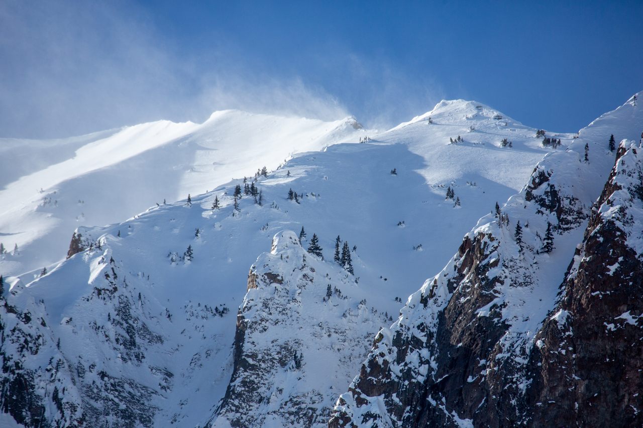 The wind tears snow from the top of Colorado's Gothic Mountain. Wind is one of many factors driving snow sublimation.