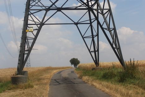 Close view at the roadway passing through the legs of this tower.