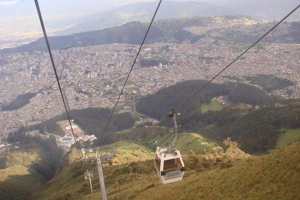 A Teleférico cable car hovers over Quito.
