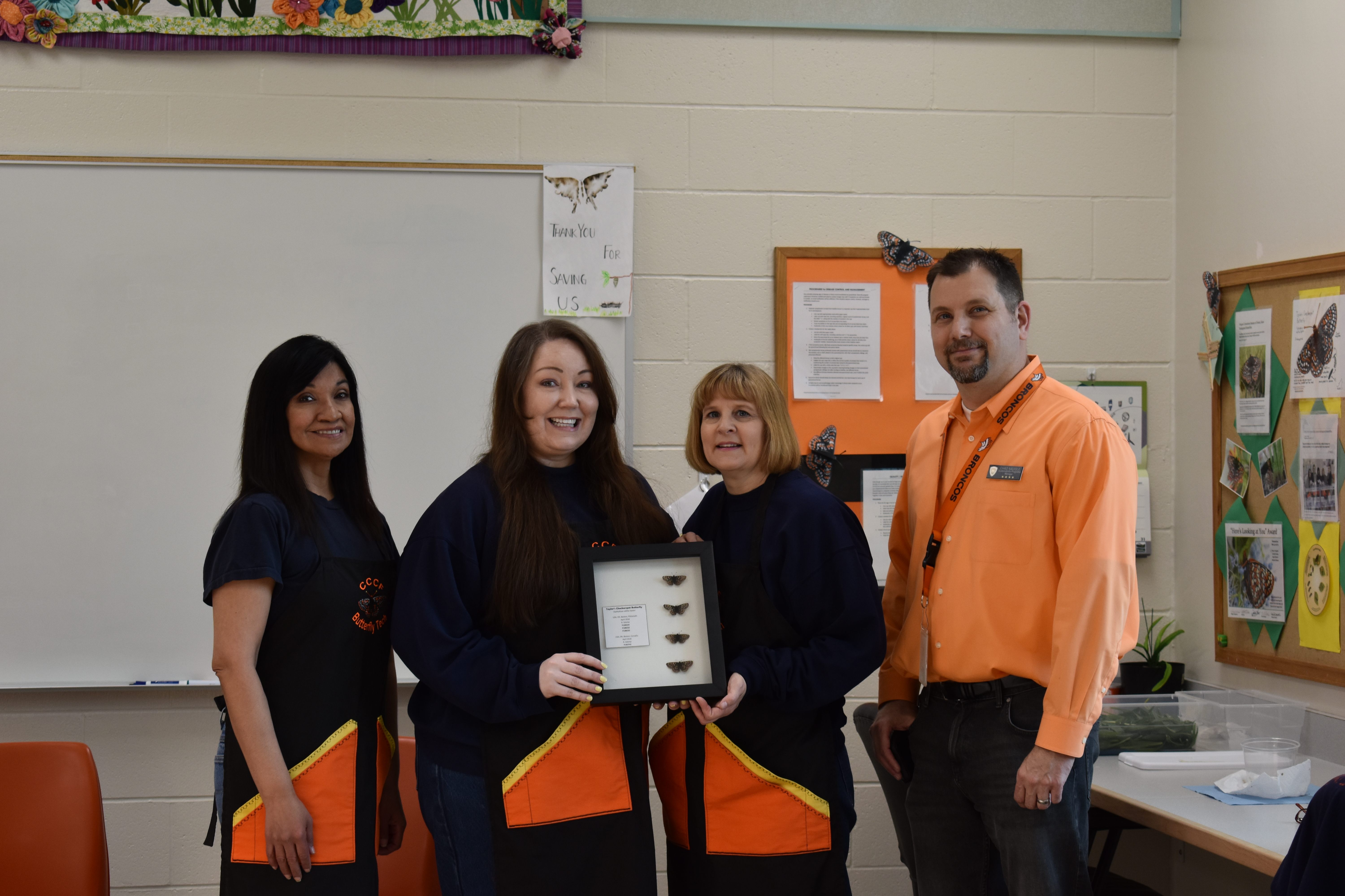 The lab's technicians, Mary Arreguin, Sarah Martin, and Carolyn Exum, along with Chad Naugle.