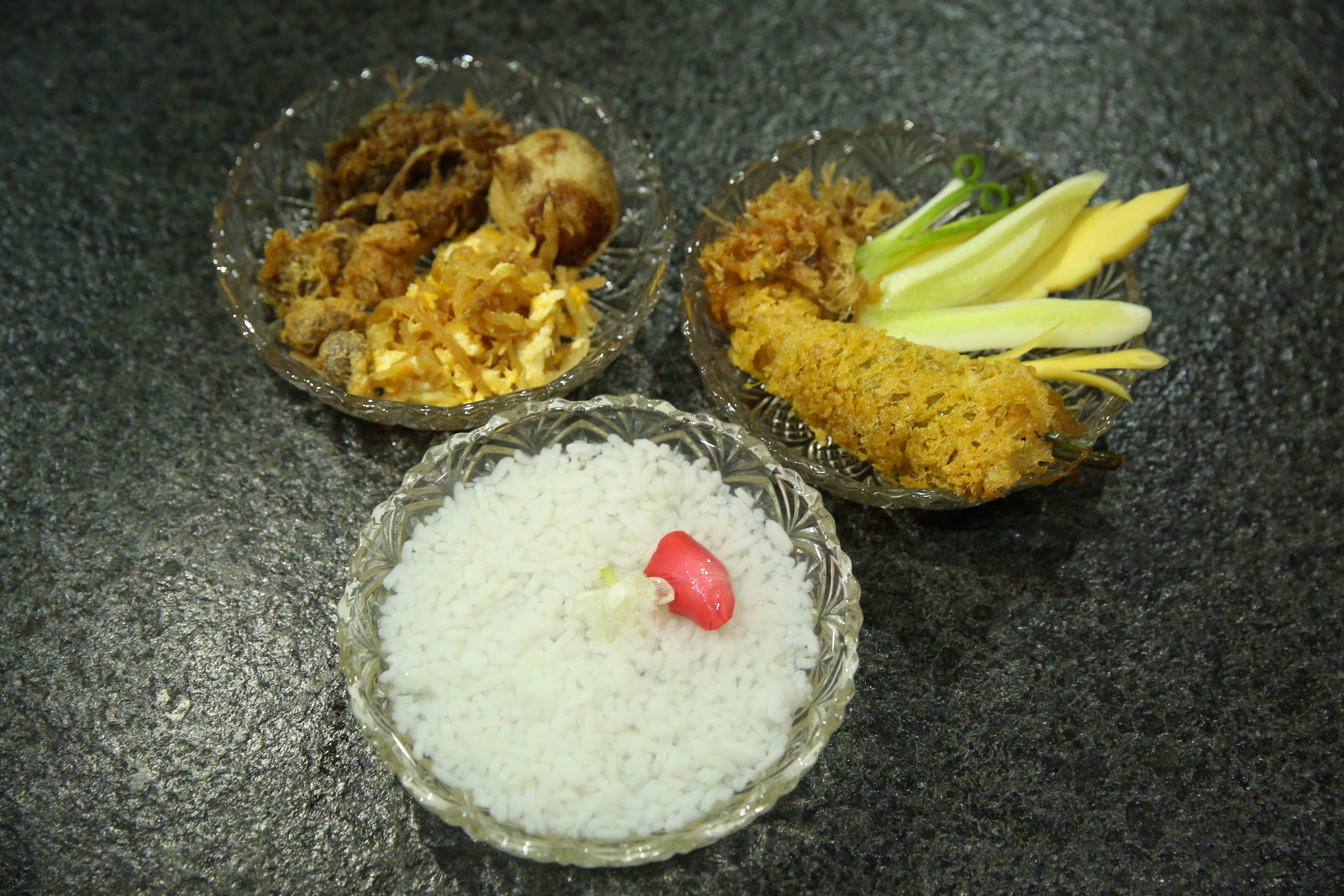  <em>Khao chae,</em> candle-scented rice in jasmine-scented water, is associated with Songkran or Thai New Year.