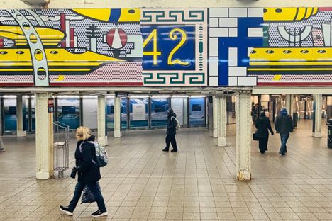 The mural hangs directly underneath 42nd Street.
