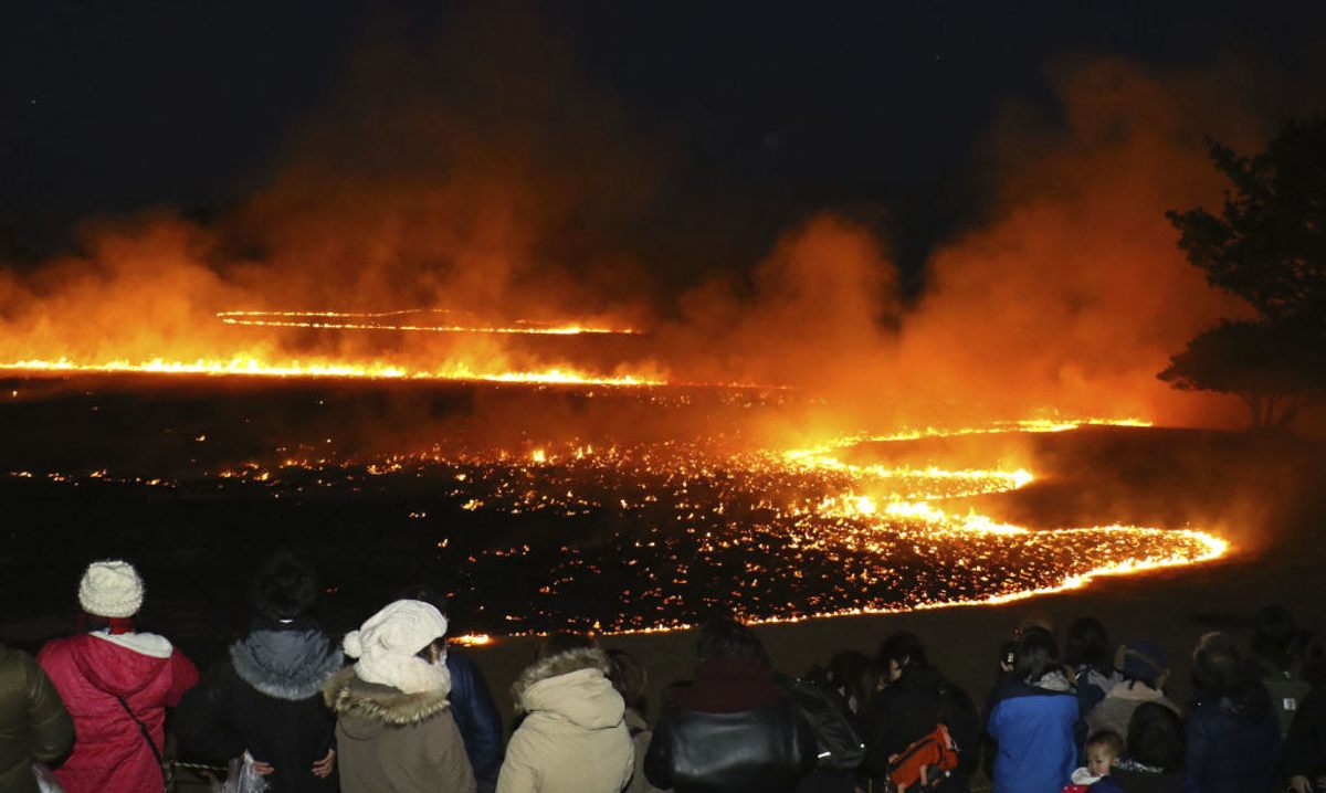 At the annual Kushimoto Fire Festival in Wakayama Prefecture, Japan, 25 acres of grass are burned off at the southernmost point of Honshu, the country's largest island. (2020)